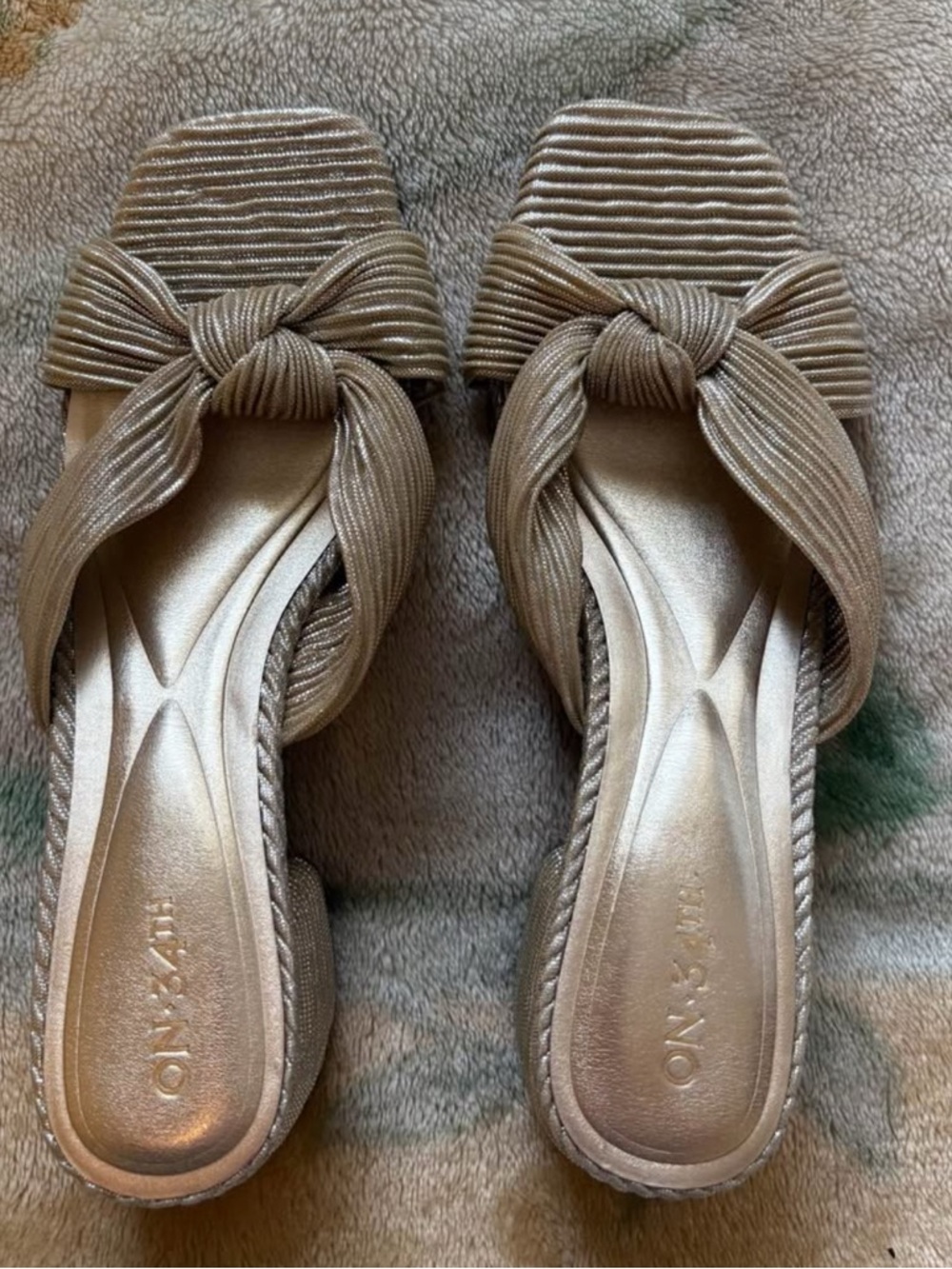 Metallic Knot-Front Slide Sandals in Champagne Gold